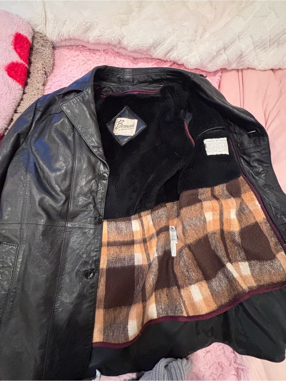 Berman’s Black Leather Coat with Brown Plaid Lining